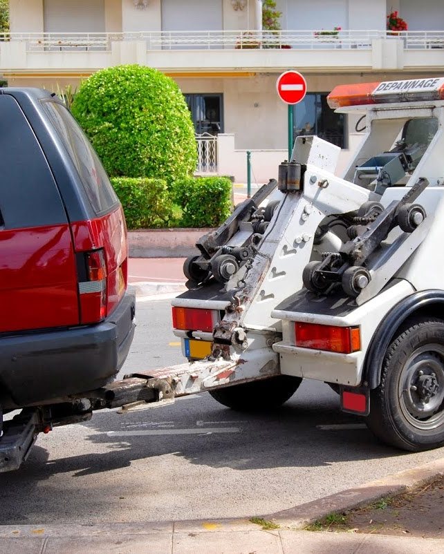 Flatbed loading a vehicle